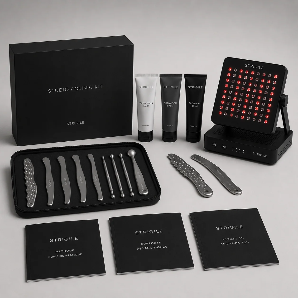 Studio / Clinic Kit : trousse de onze instruments, trois baumes, panneau Recovery Light et supports de formation